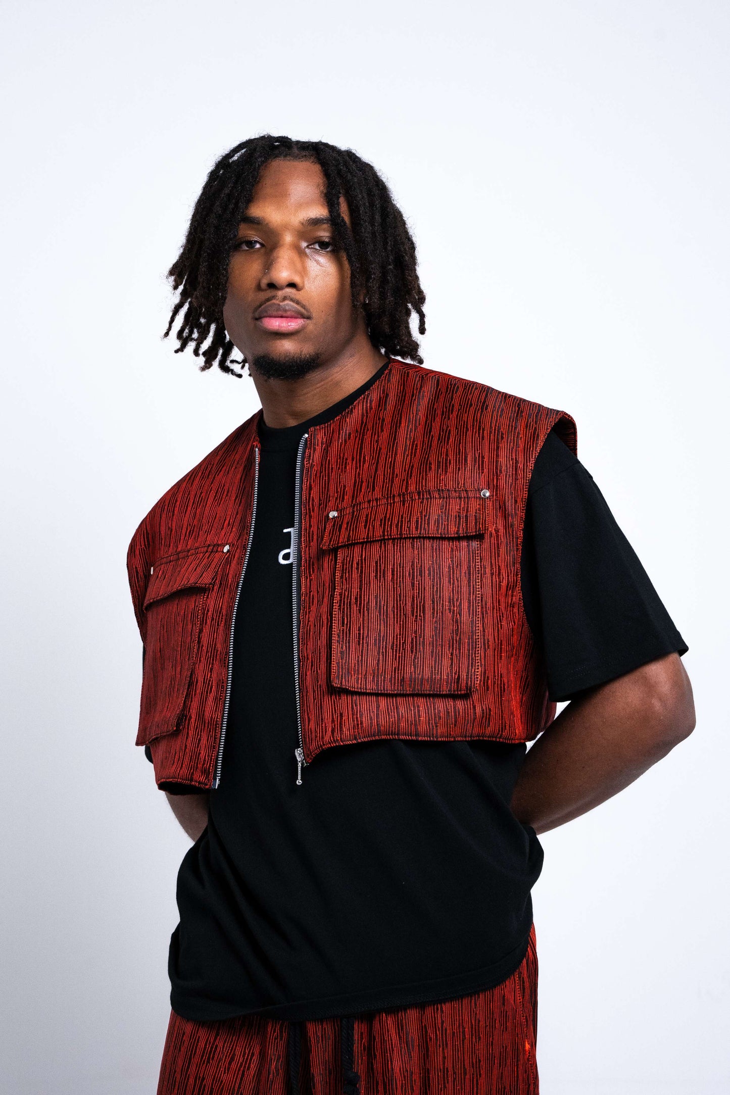 Veste sans manches zippée avec poches latérales